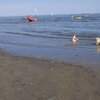 Italy, Veneto, Caorle beach, wet sand